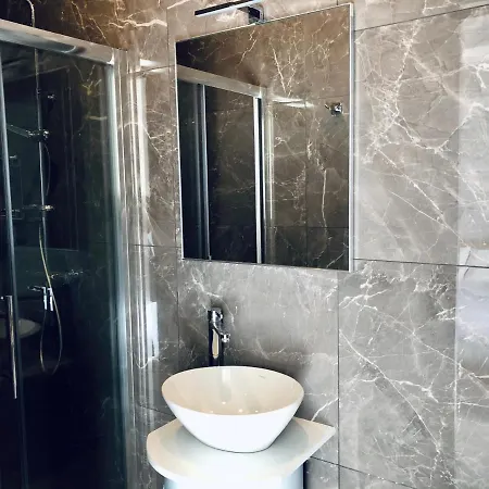 By Promenade And Apartment *