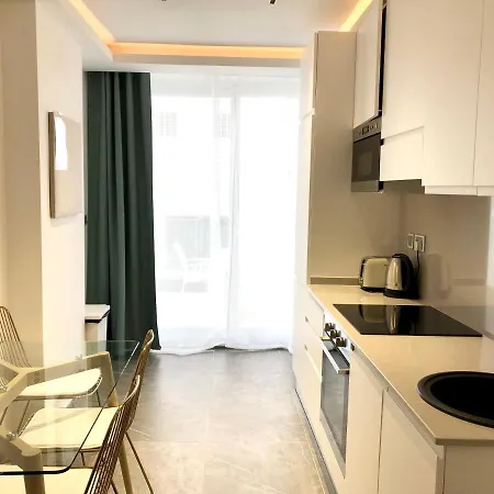 By Promenade And Apartment