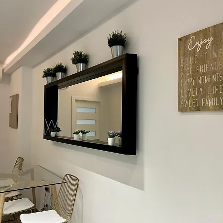 By Promenade And Apartment
